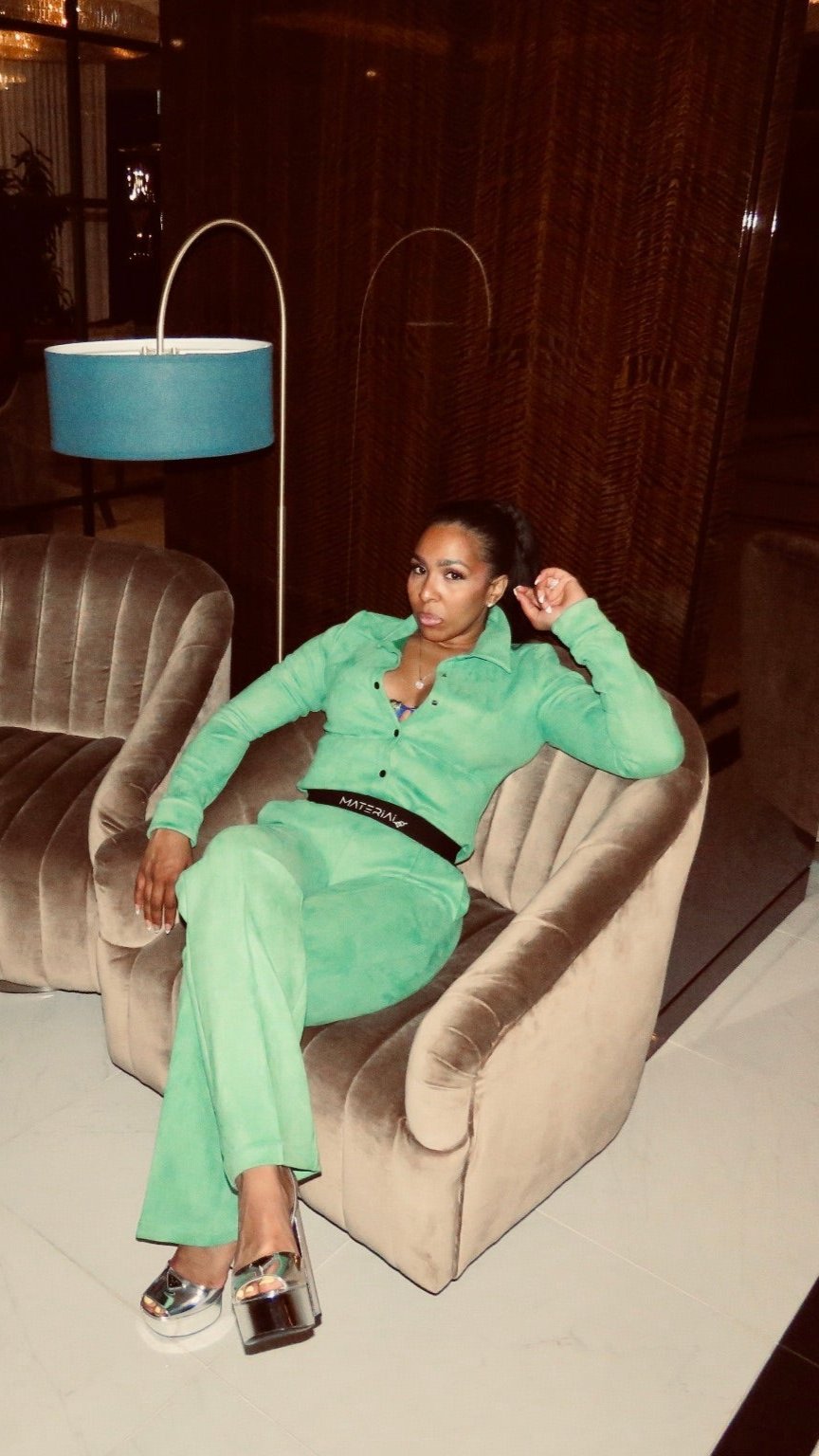 Women's green two-piece pant set. Stretch micro suede material.