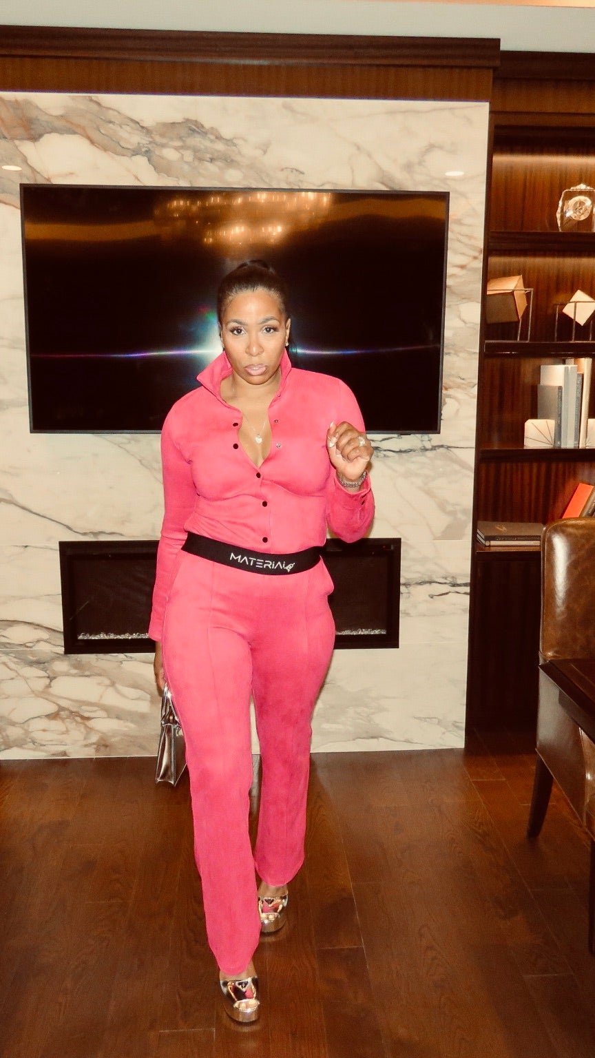 Women's fuchsia two-piece pant set. Stretch micro suede material.
